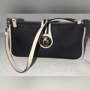 Michael Kors black canvas with cream leather trim and handle.